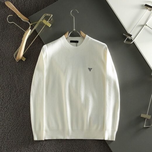 Prada Pulls de luxe en cachemire à col ras du cou et manches longues avec logo uni