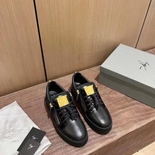Giuseppe Zanotti Baskets basses Birel noires et dorées pour homme
