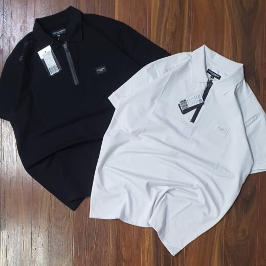 Dolce & Gabbana Polo oversize en maille à demi-fermeture éclair et monogramme