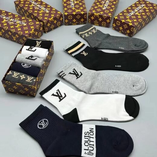 Louis Vuitton Chaussettes rayées en coton mélangé côtelé avec logo intarsia