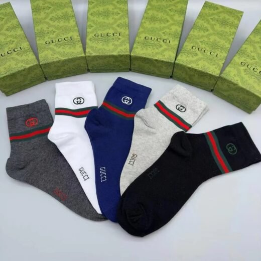 Gucci Chaussettes en coton brodées avec lettre GG