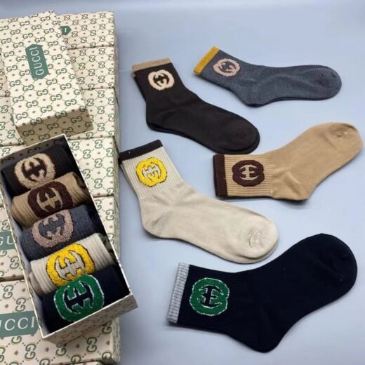 Gucci Chaussettes en maille ivoire avec logo GG Lit Circus (coffret de cinq paires)