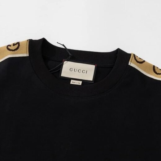Gucci T-shirt en coton blanc/noir à rayures entrelacées GG
