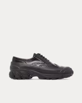 Baskets basses Burberry en cuir noir avec détails Brogue