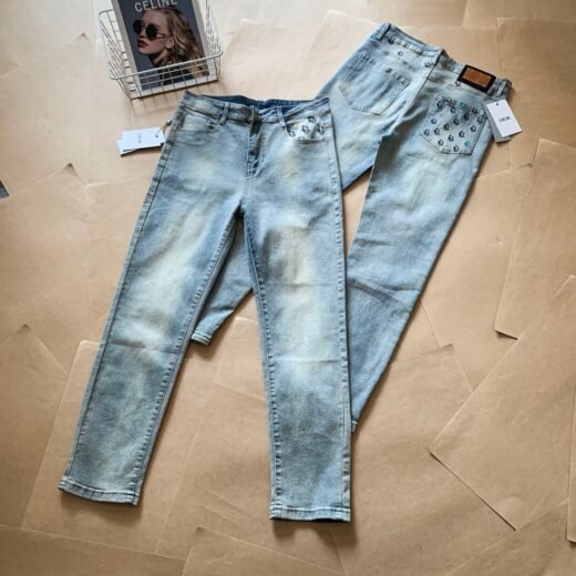 Dior Jean délavé avec poches logo brodées