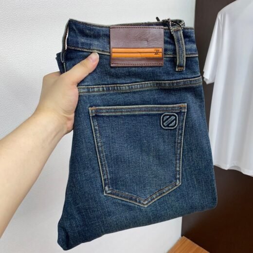 Zegna Jean en denim bleu – Coupe ajustée avec finitions en cuir