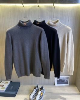 Pull col roulé Hermès en maille fine, élégance intemporelle et confort