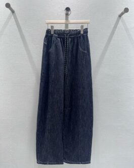Jean large unisexe Miu Miu en denim brut à taille élastique