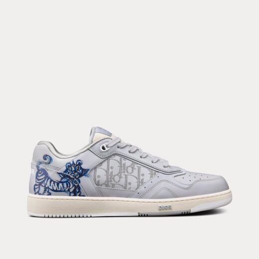 Dior Baskets basses x Kenny Scharf B27 en cuir de veau lisse avec motif Dior Oblique Galaxy gris et imprimé tigre bleu – 35