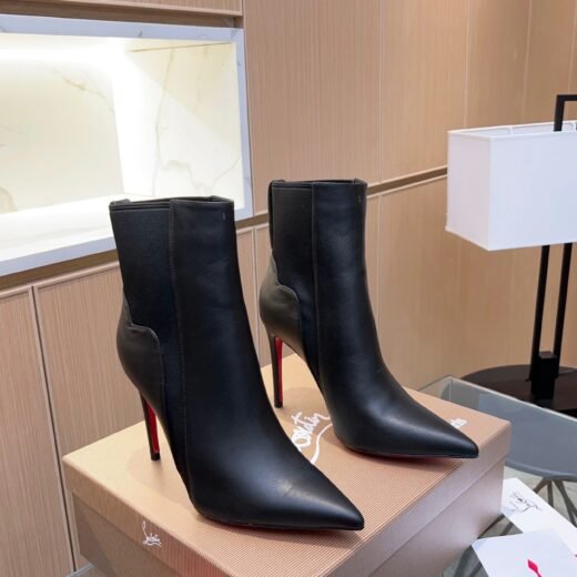 Christian Louboutin — bottines noires à talon aiguille